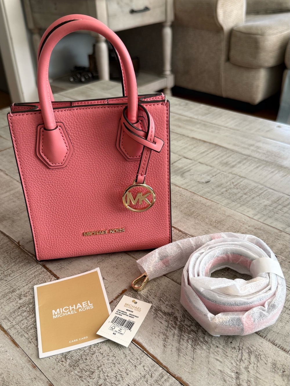 Michael Kors Coral Pink Pebbled Leather Mini Tote with Gold MK Charm